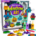 Halloween window art kit with various suncatcher frames and glow-in-the-dark paints, including candy corn, bat, pumpkin, and vampire designs.
