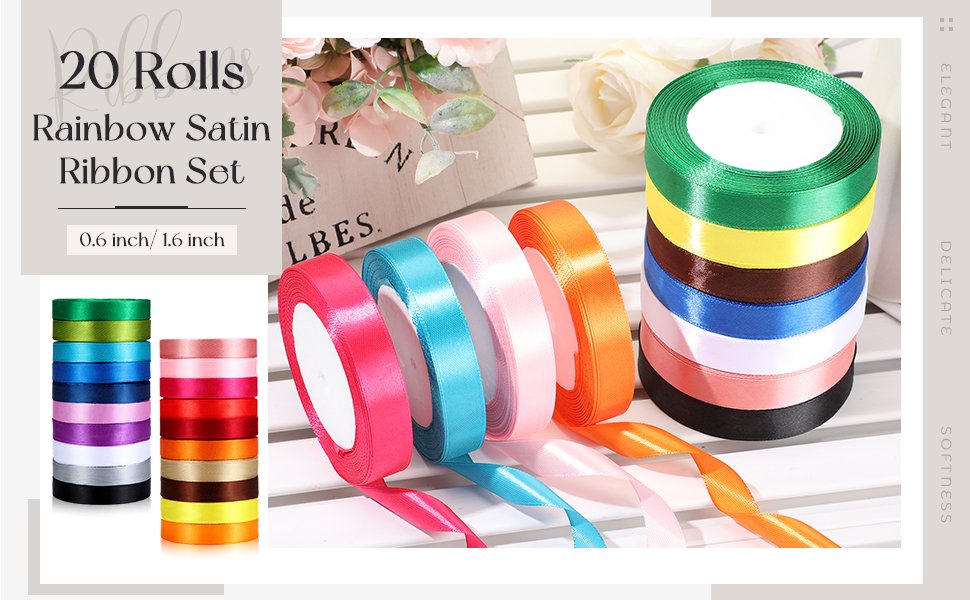 Stacks of rainbow satin ribbon rolls in various colors, some unspooling, with decorative flowers in the background.