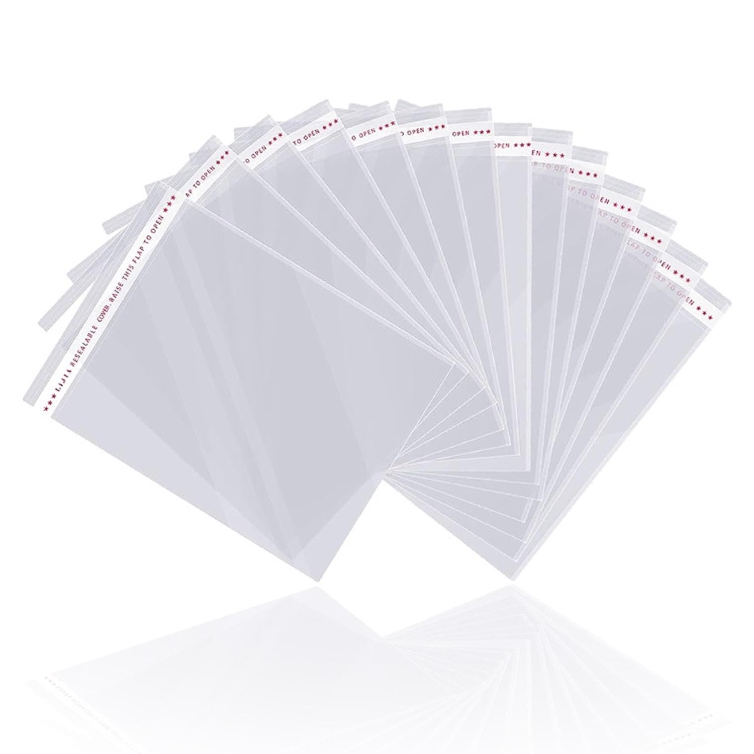 Fan of clear cellophane bags with resealable adhesive strips, shown on a white background.