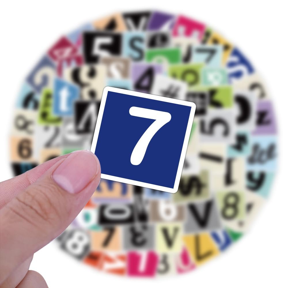 Hand holding a blue square sticker with a white number 7, with a blurred background of alphabet and number stickers.