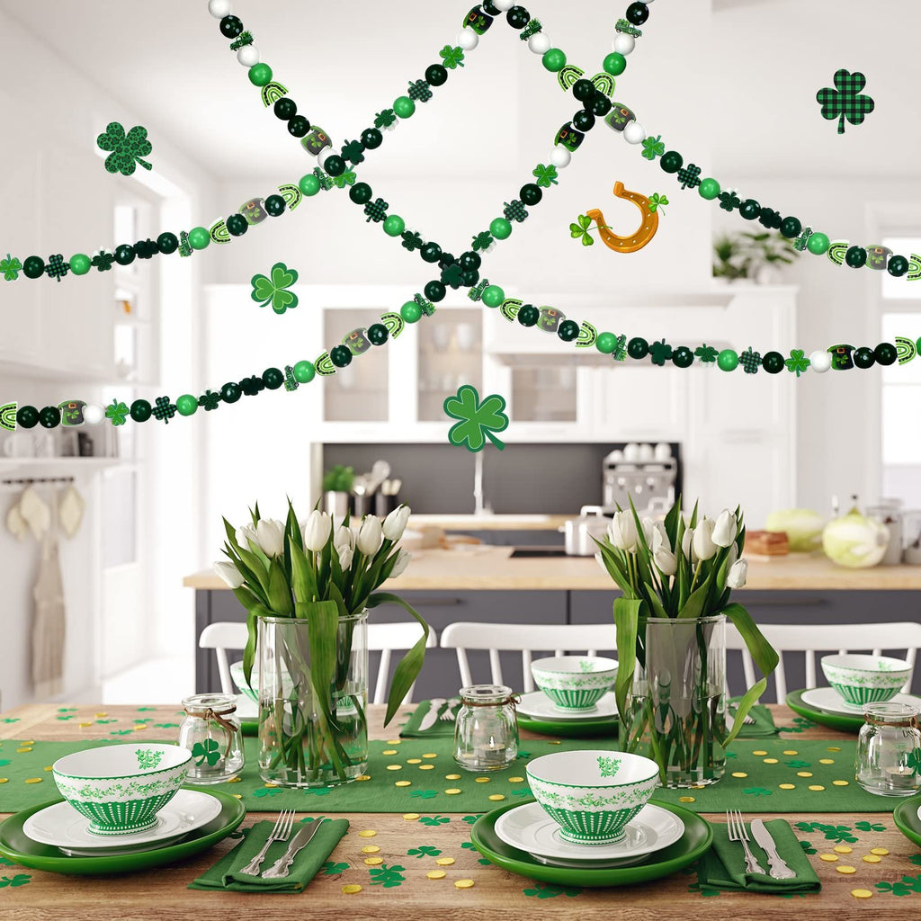 St. Patrick's Day themed table setting with beaded garlands and shamrock decorations