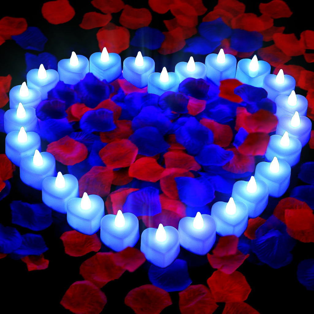 Heart shape arrangement of 24 LED flameless tea lights on red and blue rose petals