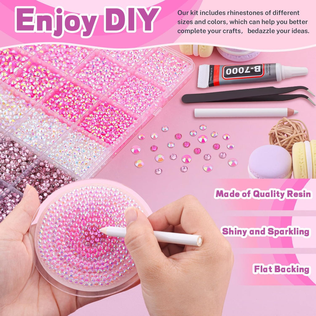 Pink and clear resin rhinestones in a divided case, with tweezers, a pickup pen, and B-7000 glue.