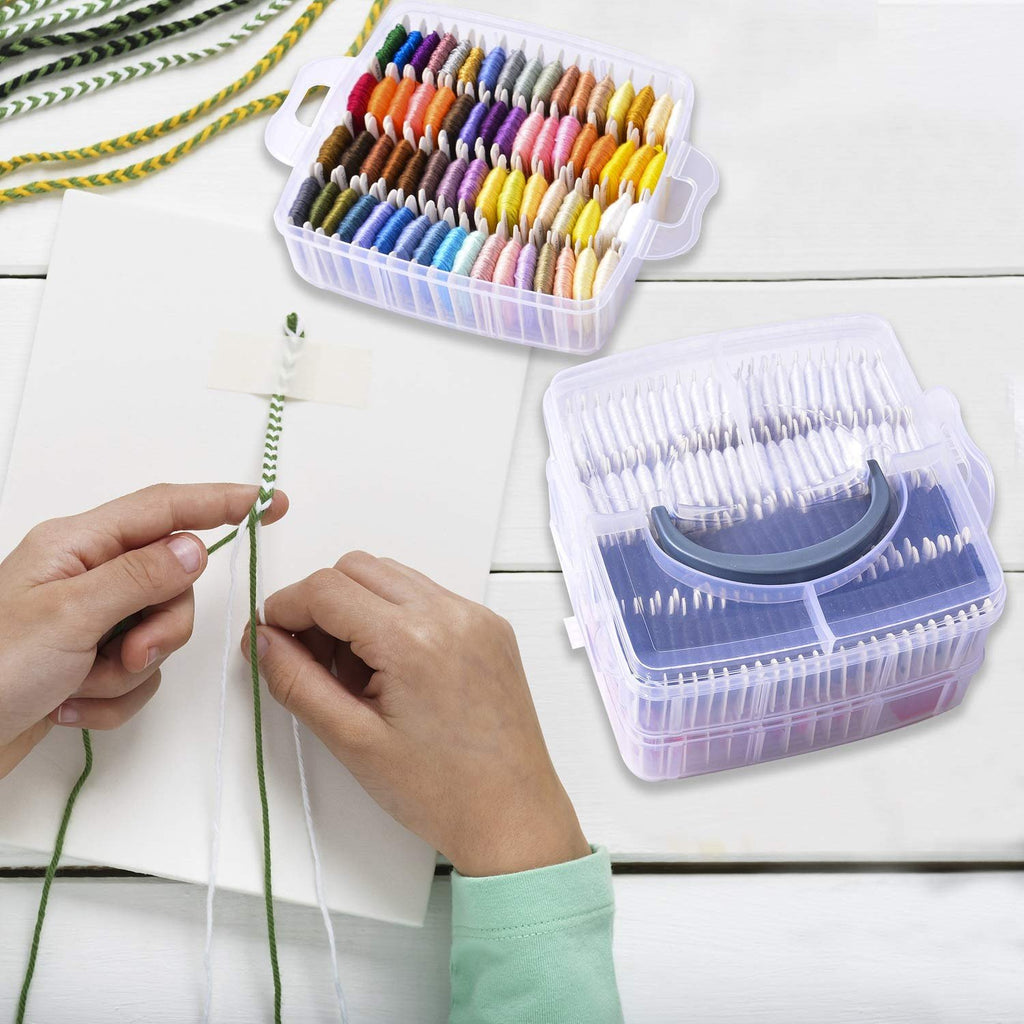 Hands making a friendship bracelet with colorful embroidery floss and organizer boxes.