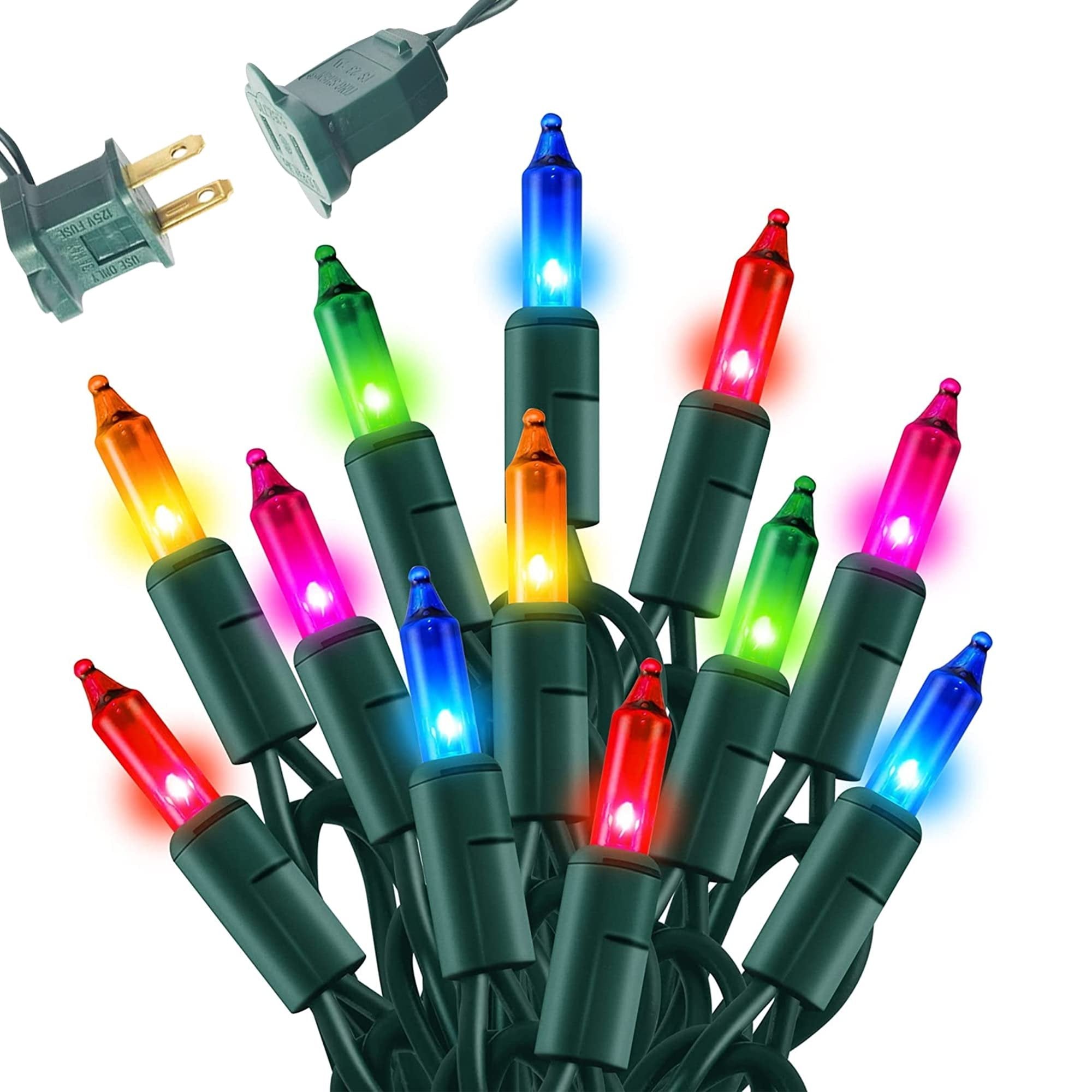 Cluster of multi-colored incandescent mini string lights with green wire and two plugs on a white background.