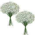 Two bouquets of artificial white baby's breath flowers with green stems tied together