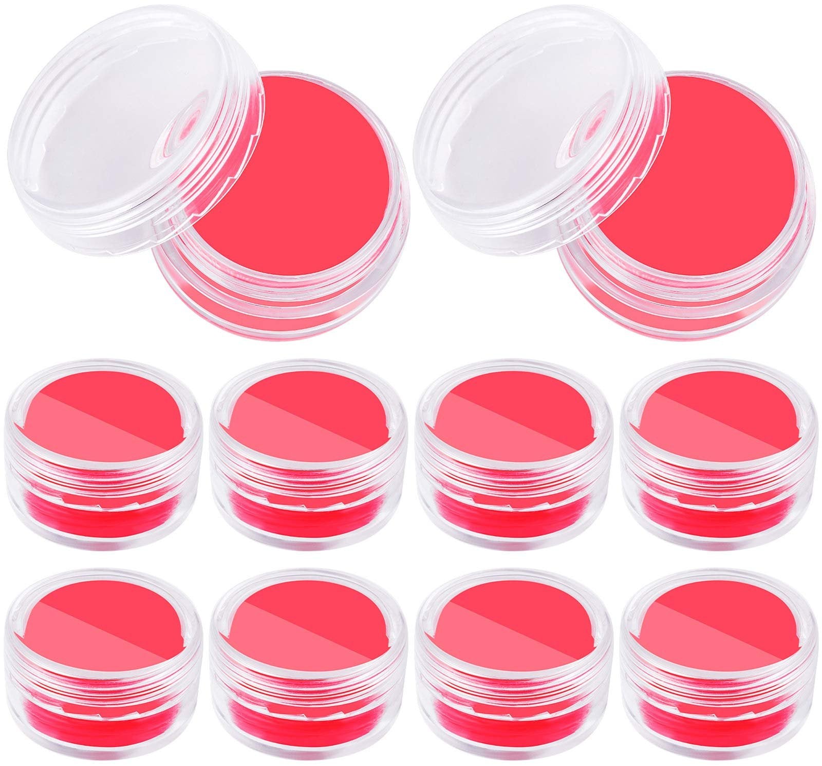 Eight small clear plastic containers filled with red diamond art wax, with lids open on two containers.