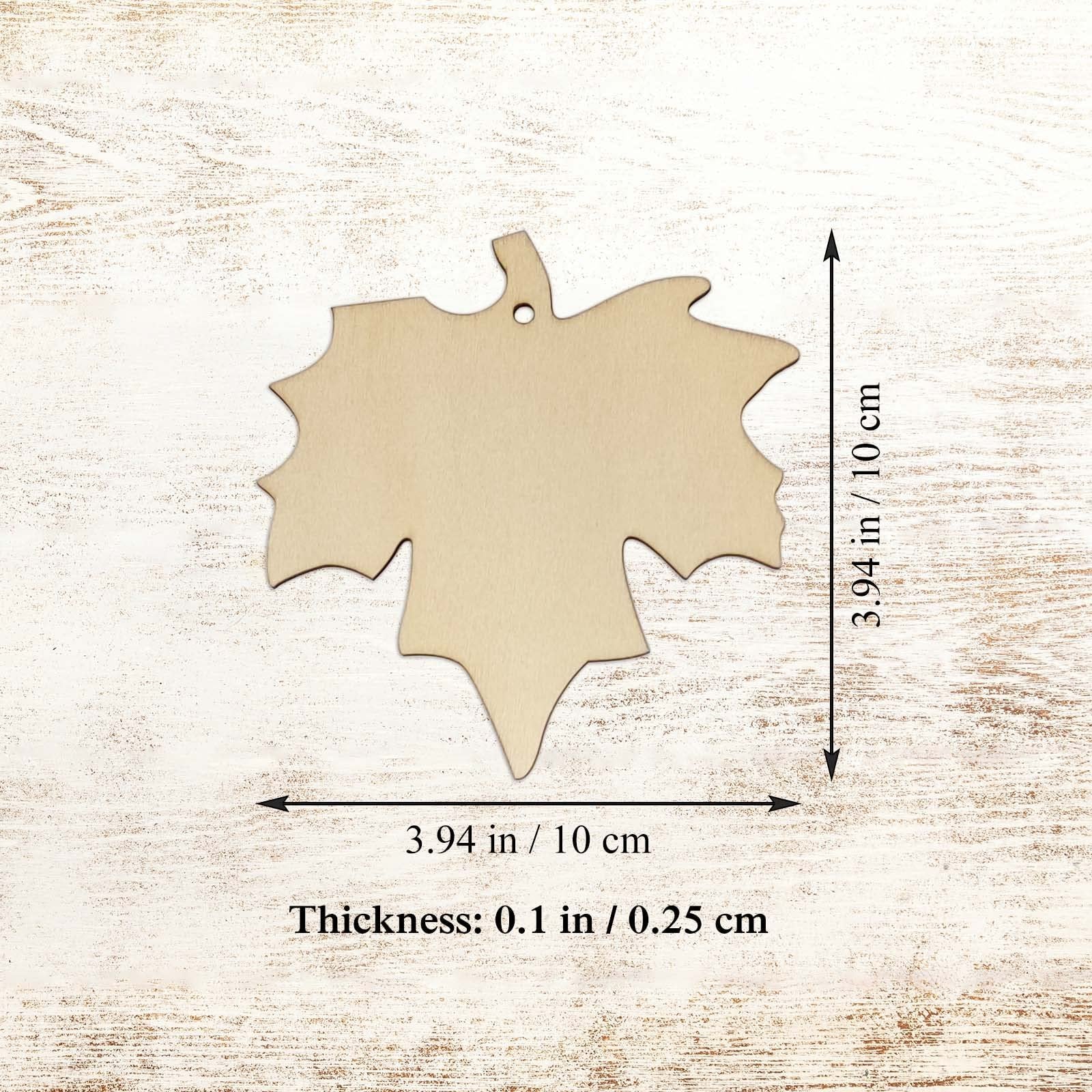 Maple leaf wood cutout showing dimensions and thickness on a light wood background.
