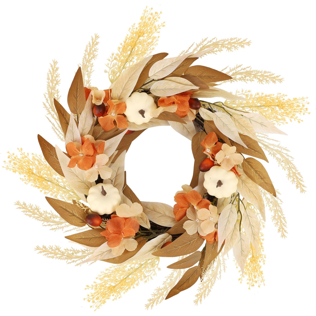 Artificial fall wreath with white pumpkins, orange flowers, and autumn leaves on a white background.
