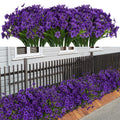 Bundles of artificial purple flowers with green stems displayed against a white background and then planted along a fence and walkway.