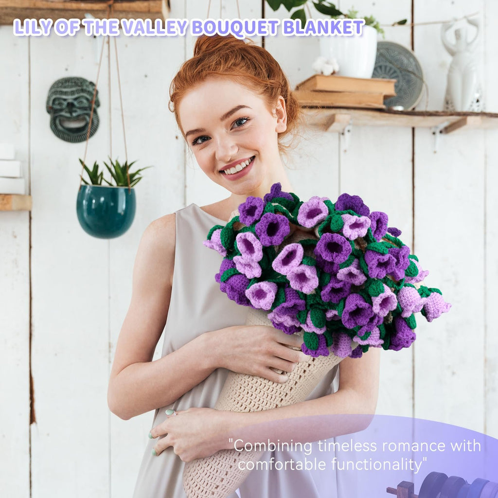 Woman holding a crochet lily of the valley bouquet blanket kit, smiling at the camera.