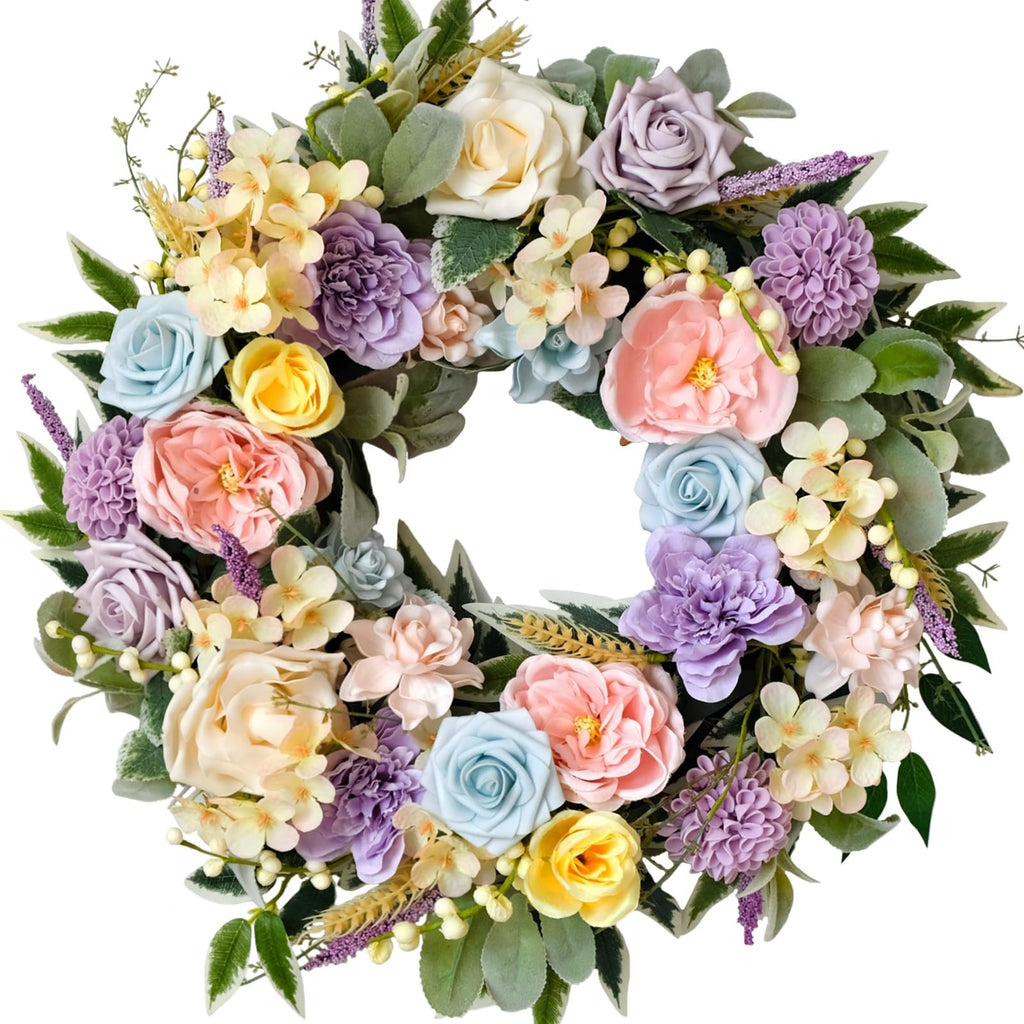 Artificial floral wreath with roses, peonies, hydrangeas, and leaves in pastel colors on a white background.