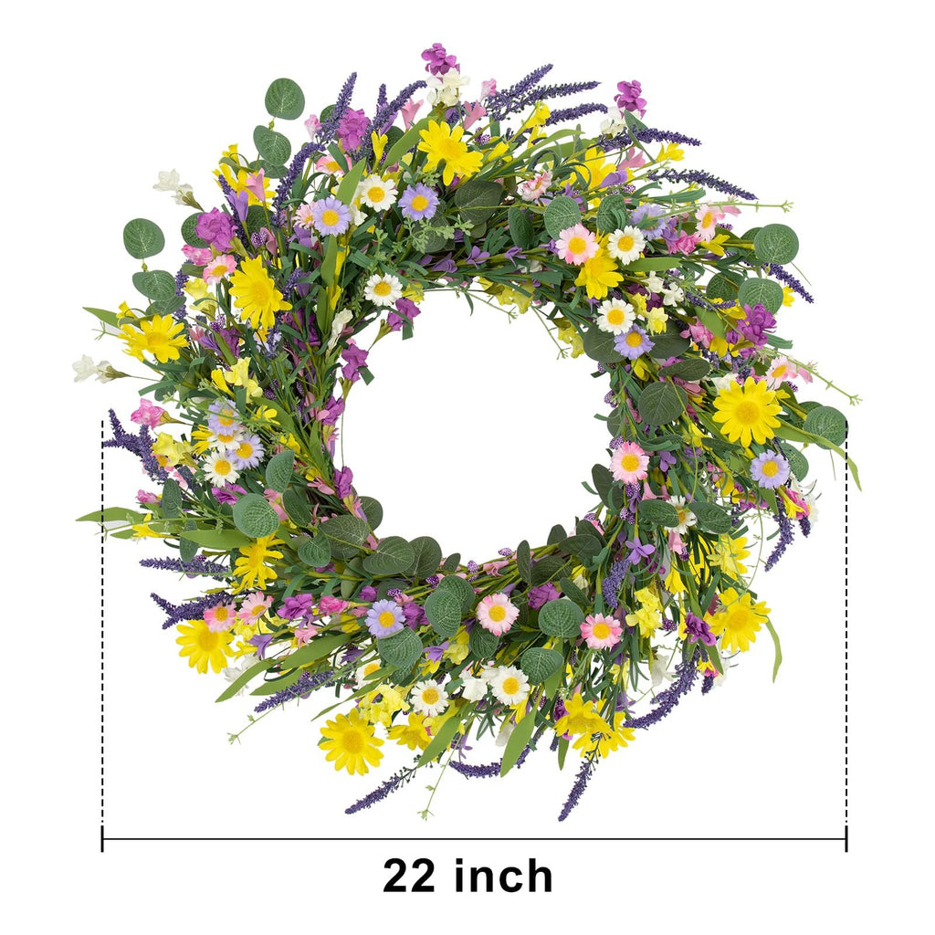 22 inch artificial spring wreath with daisies, lavender, jasmine, and wildflowers on a grapevine base, shown front-on against a white background.