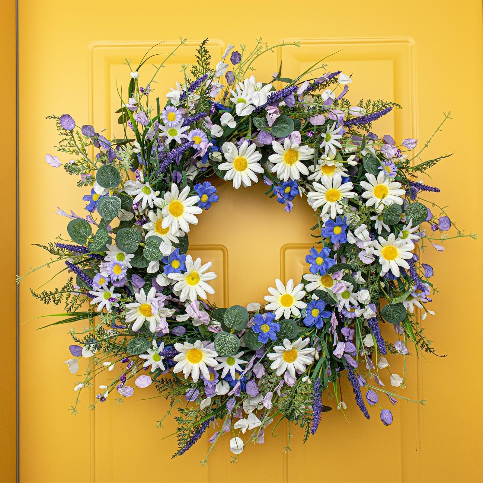 22-inch blue summer wreath with daisies, lavender, wildflowers, and eucalyptus on a yellow door