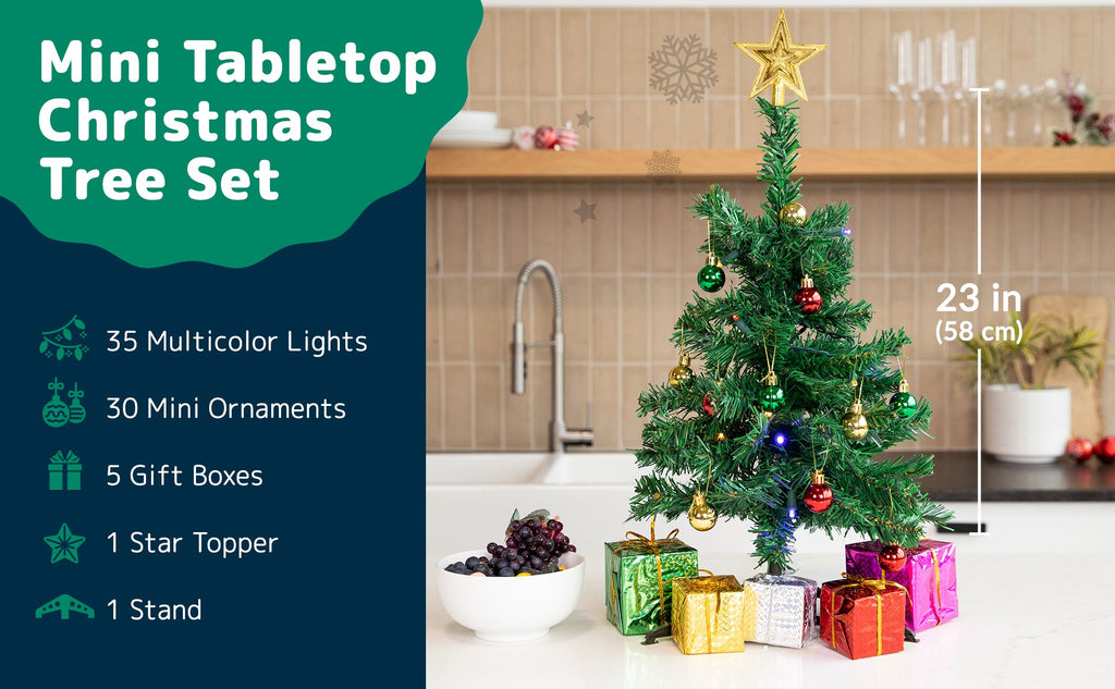 Mini tabletop Christmas tree set with 35 multicolor lights, 30 ornaments, 5 gift boxes, star topper, and stand, 23 inches tall.