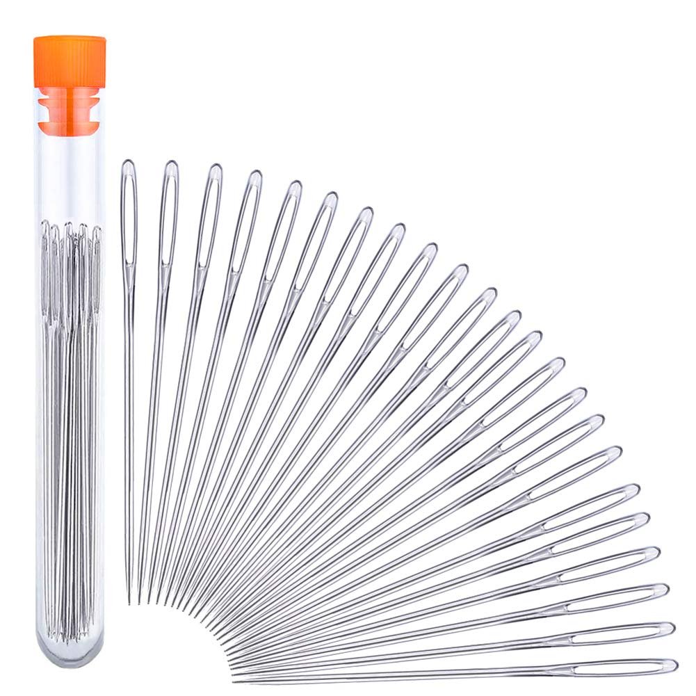 Set of stainless steel hand sewing needles with large eyes, stored in a clear tube with an orange cap.