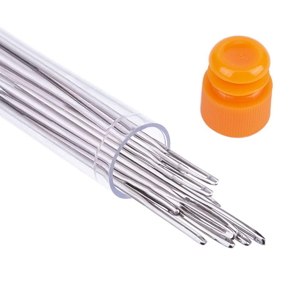 Large eye sewing needles in a clear plastic tube with an orange cap, close-up view.