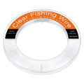 Spool of clear monofilament fishing line with orange and black label showing specifications and brand name.