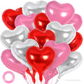 A collection of red, pink, and silver heart-shaped foil balloons with pink ribbon and a white straw against a white background.