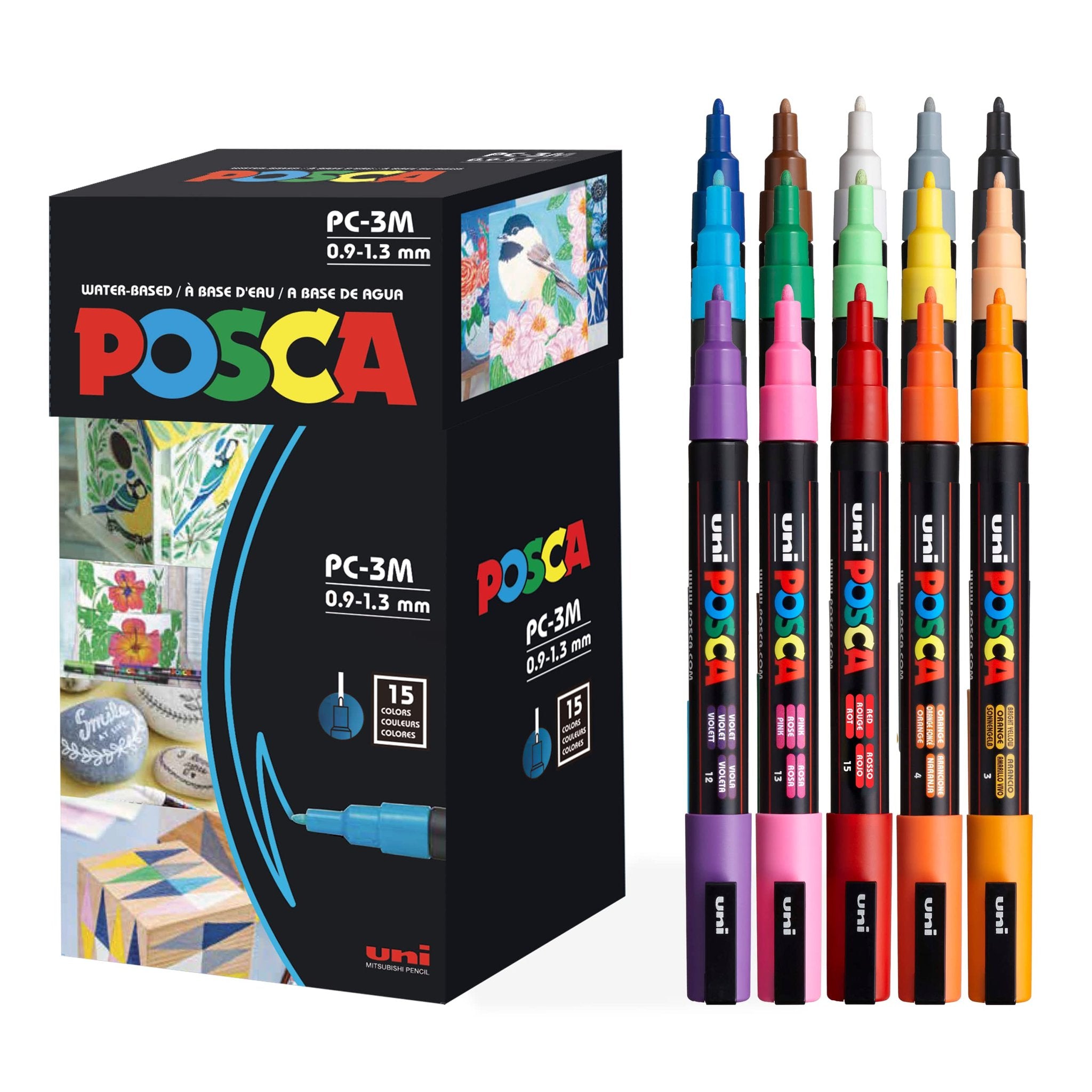 Set of paint markers and their box, showing various colors and artwork on the packaging.