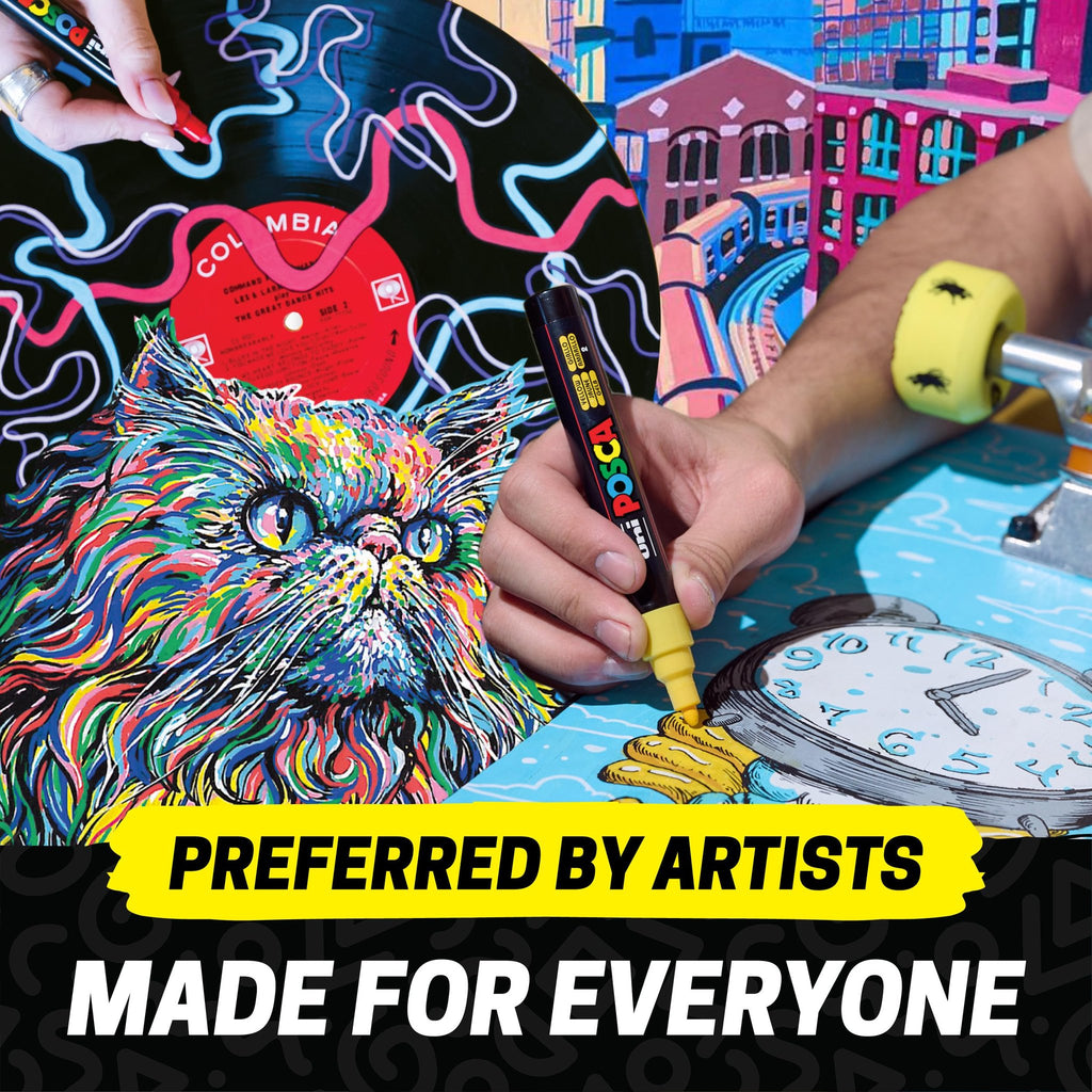 Hands using paint markers to draw on a vinyl record, skateboard, and clock face with colorful abstract art.