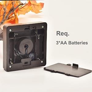 Artificial lighted maple tree base showing battery compartment and text 'Req. 3*AA Batteries'.