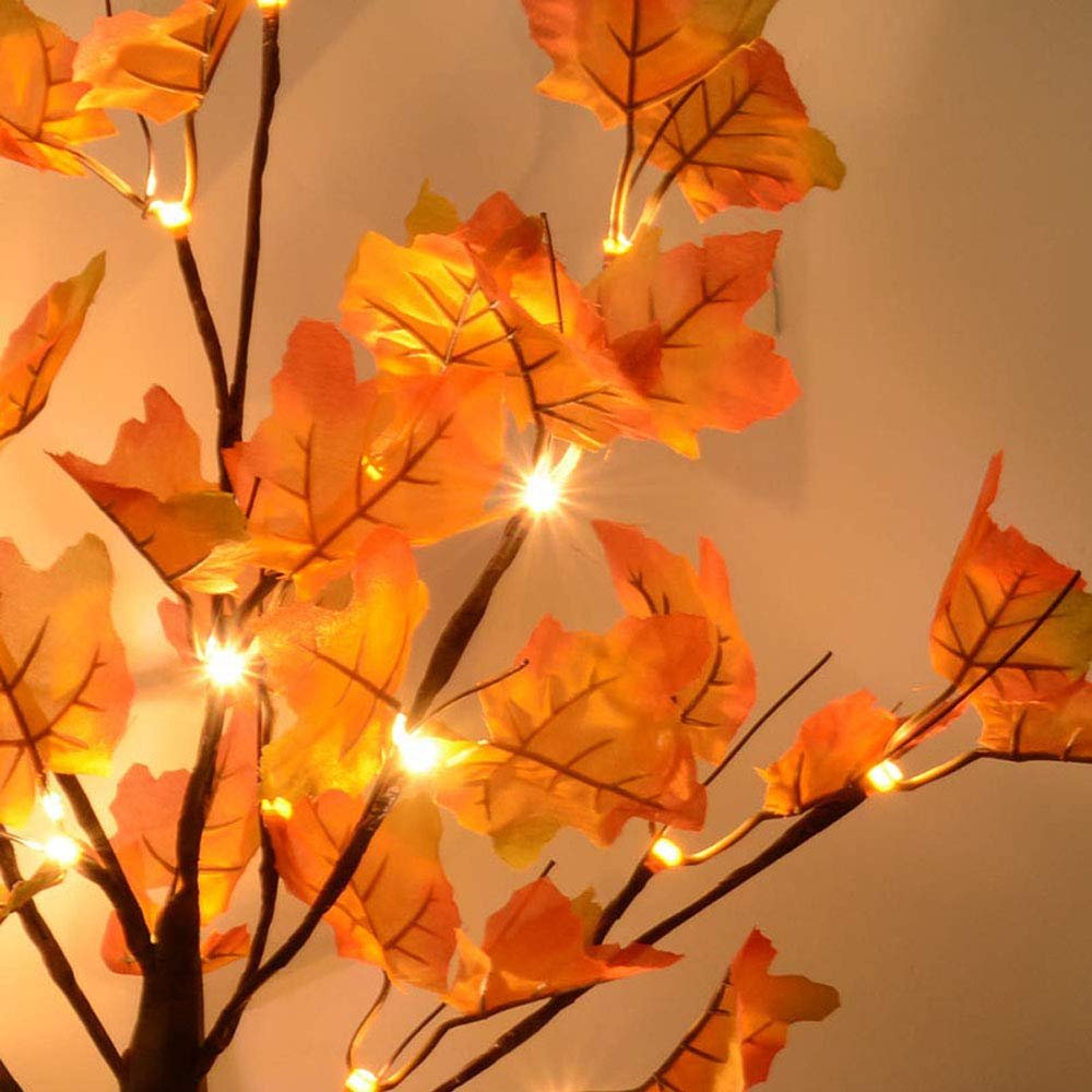 Close-up of an artificial maple tree with orange-red leaves and 24 LED lights, showing branches and illuminated foliage.