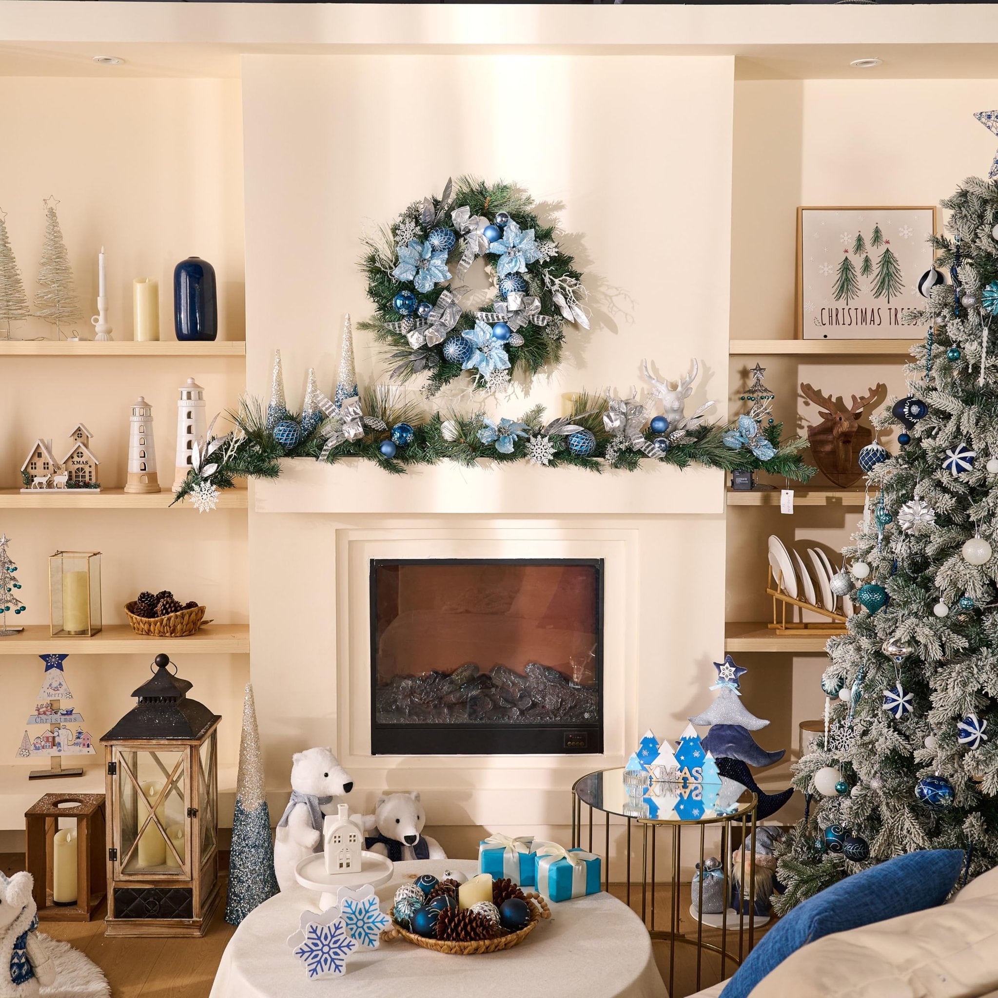 Christmas living room with a pre-lit artificial tree, decorated mantel, and festive ornaments.