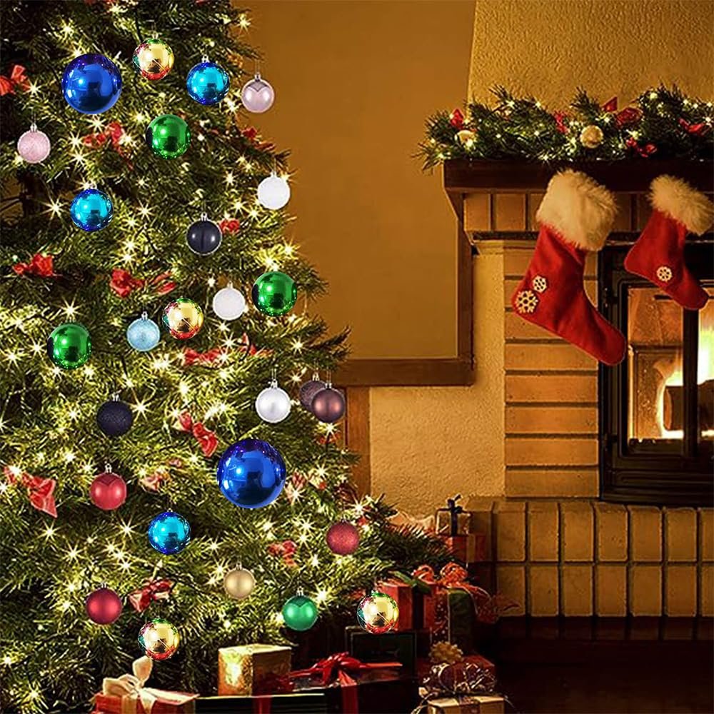 Christmas tree decorated with colorful glitter ball ornaments and lights, next to a fireplace with stockings.