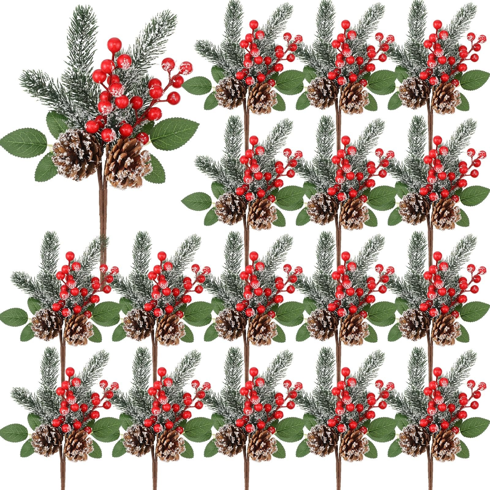 Christmas artificial flower picks with red berries, pine cones, and frosted pine branches arranged in a grid.