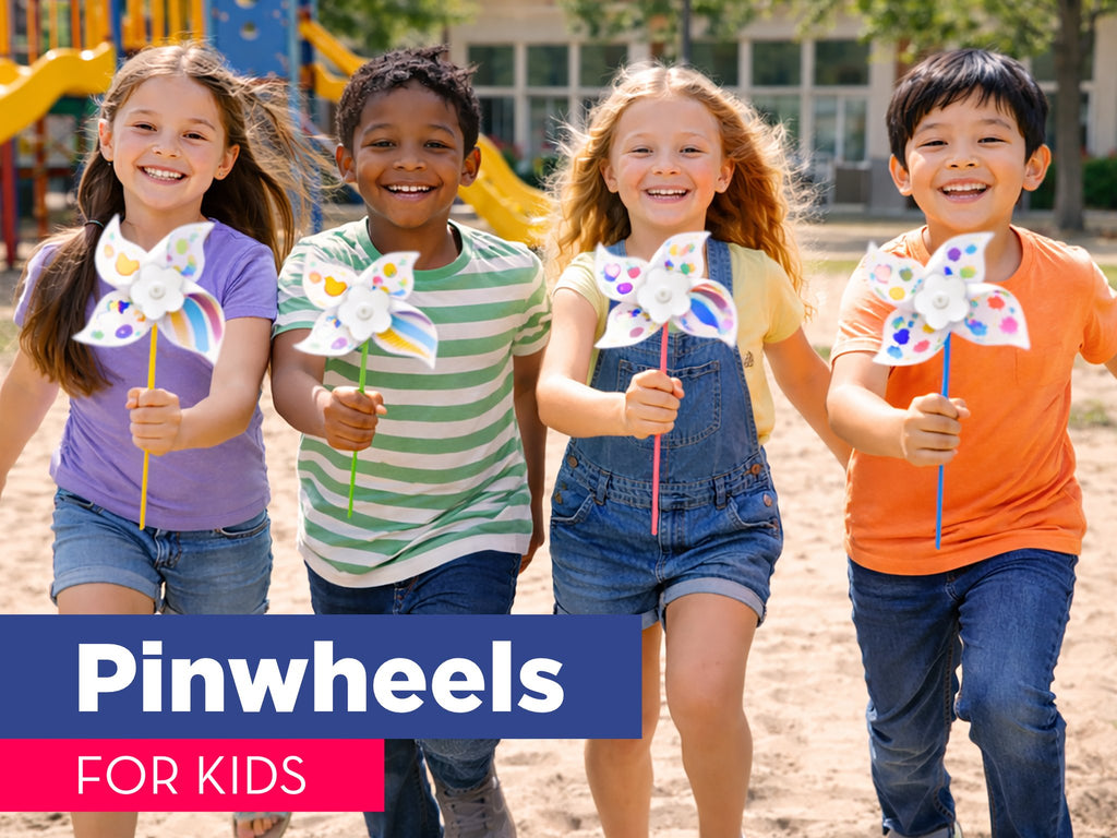 Four smiling children walk across a sandy playground holding colorful DIY pinwheels. A blue banner with white text reads 'Pinwheels FOR KIDS'.