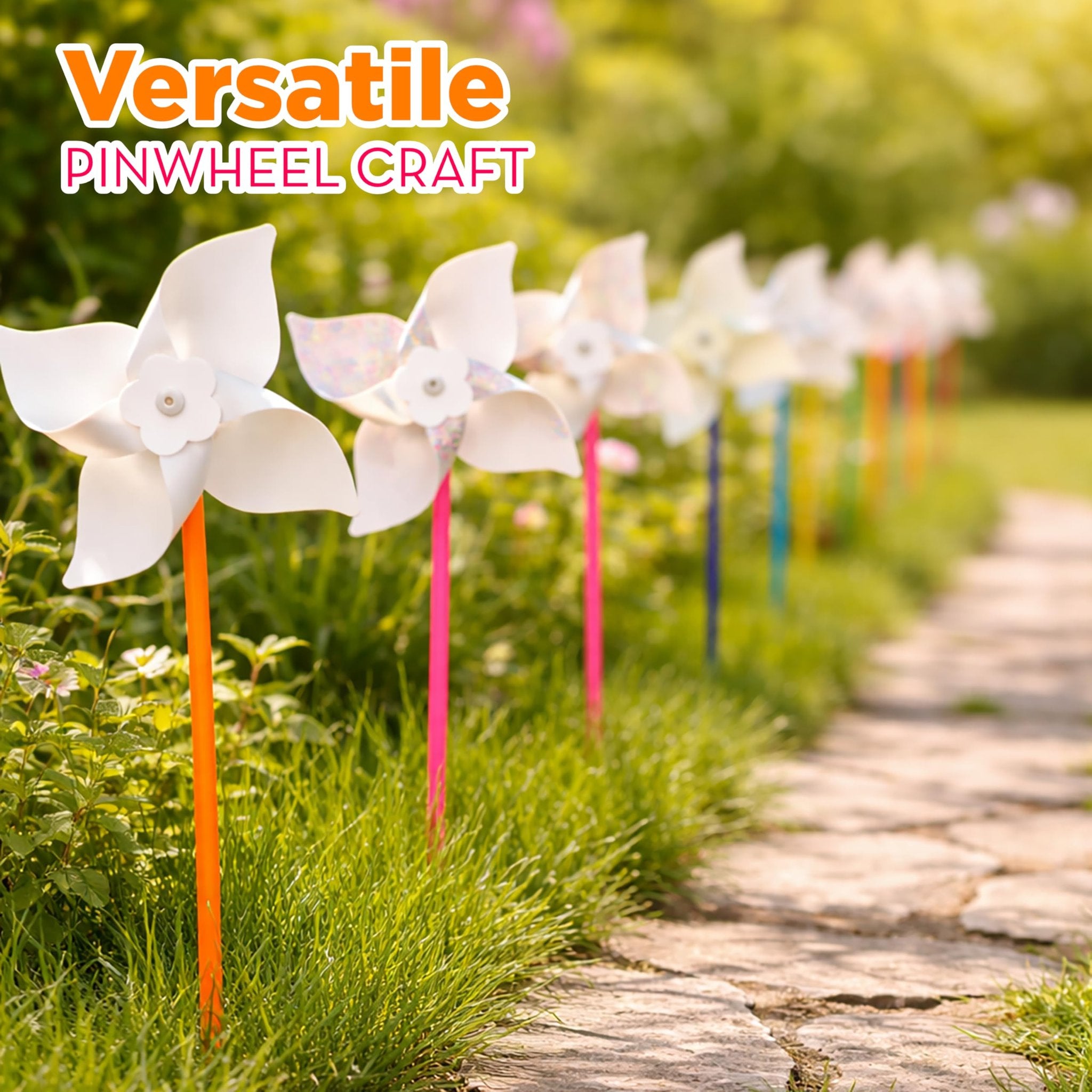 Row of white DIY pinwheels with colorful sticks planted in grass along a stone path