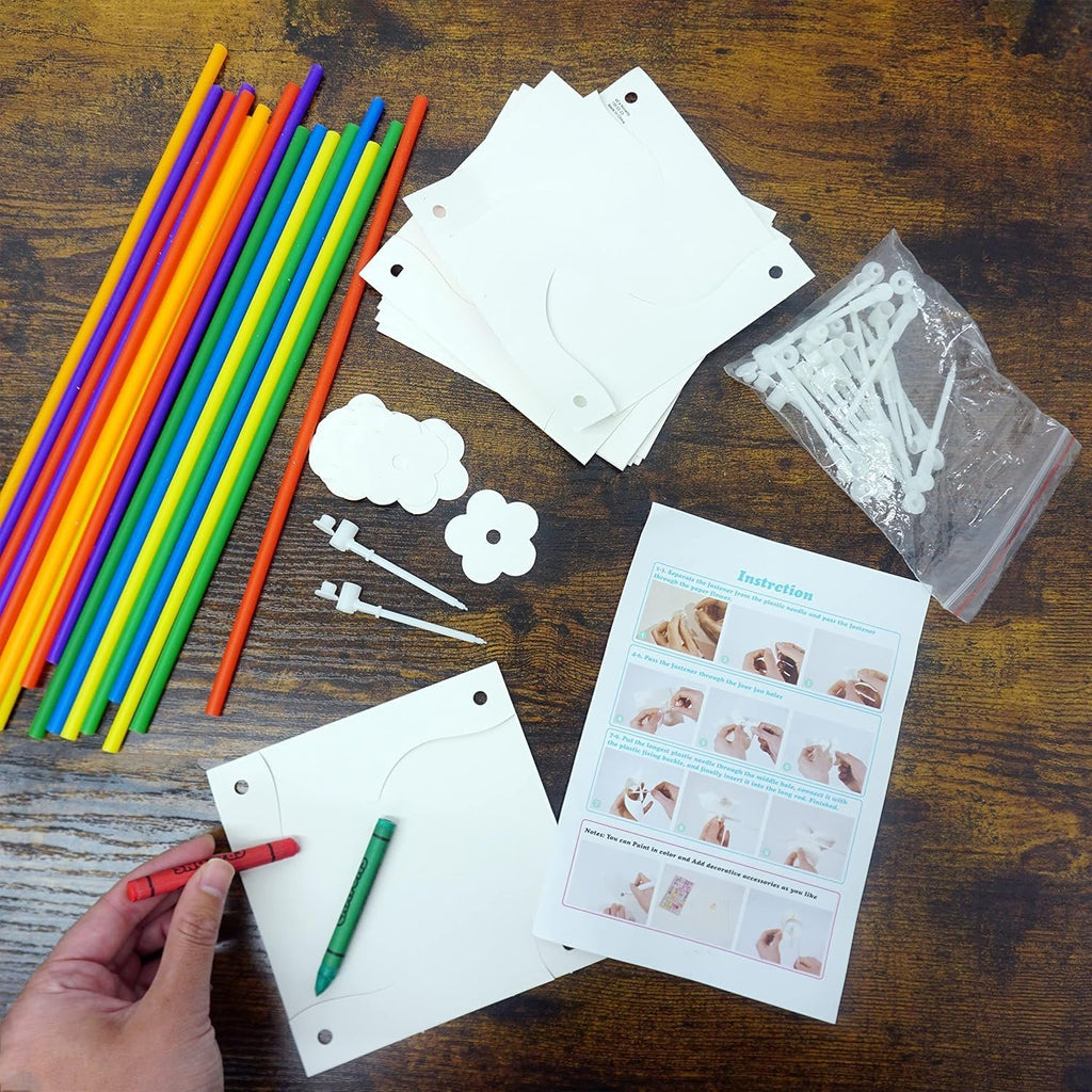 DIY pinwheel craft kit contents including colorful sticks, paper shapes, fasteners, and instructions.