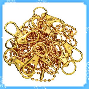 Pile of gold-tone metal keychain clasps and ball chains, top-down view.