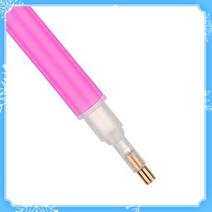 Pink diamond painting drill pen with gold metal tip, close-up shot against white background with snowflake border.