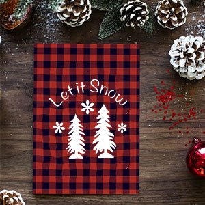 Christmas card with red and black buffalo plaid pattern, white text 'Let it Snow', and two white Christmas trees with snowflakes.