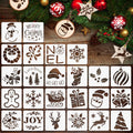 Collection of 24 Christmas-themed stencils on a wooden background with festive decorations.