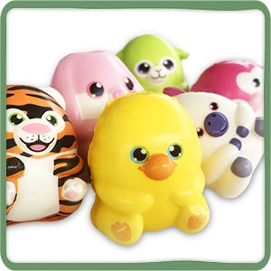Group of six colorful slow-rising squishy toys including a tiger, duck, and other animal designs.