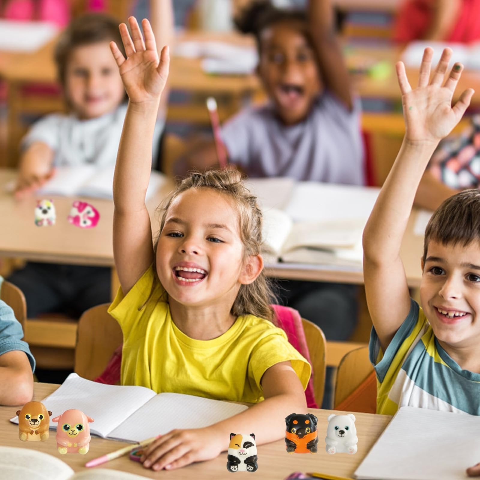 Children in a classroom raising hands with squishy toys on their desks