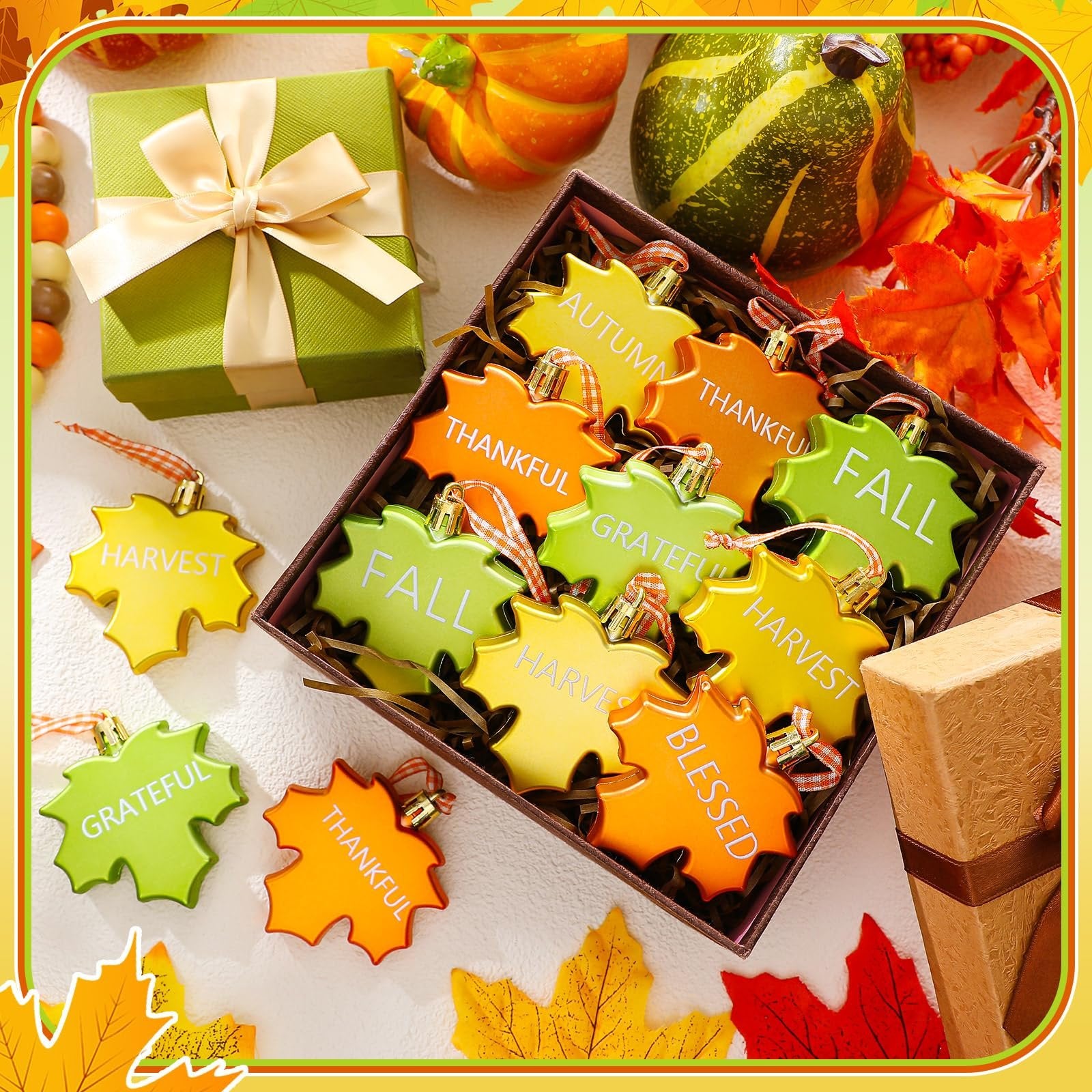 Thanksgiving maple leaf ornaments with words like Fall, Harvest, Grateful, Blessed, Autumn, Thankful in a gift box.