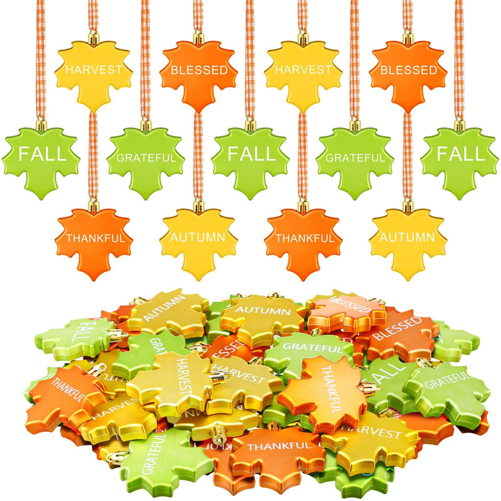 Thanksgiving maple leaf hanging ornaments with words like Harvest, Blessed, Fall, Grateful, Thankful, Autumn.