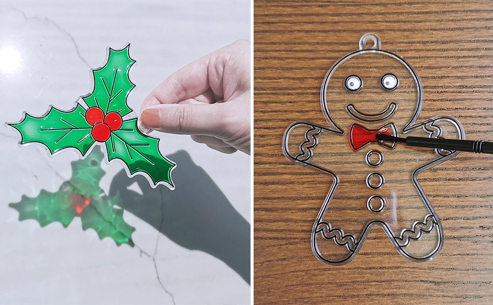DIY Christmas suncatcher craft kits with holly and gingerbread man designs being painted.
