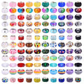 Assortment of 240 colorful lampwork spacer beads with brass cores for jewelry making, various sizes and designs.