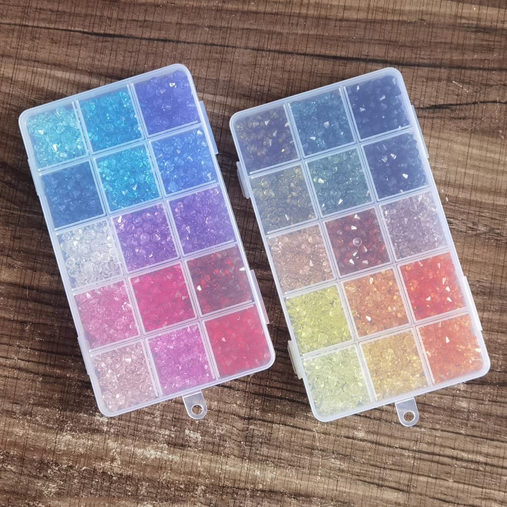 Two clear plastic organizer boxes filled with colorful 6mm faceted acrylic beads for jewelry making.