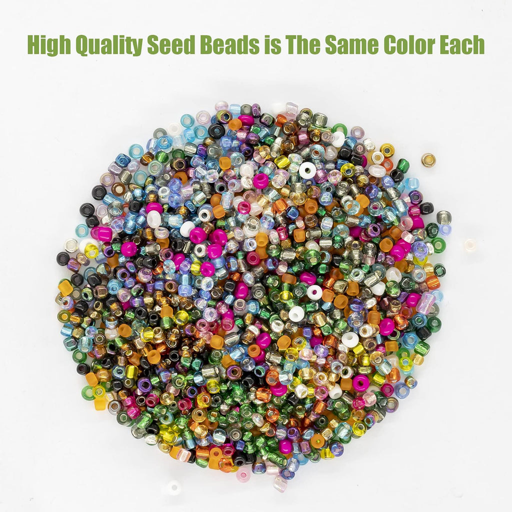 Pile of 2mm glass seed beads in various colors, including pink, blue, green, yellow, and black, on a white background.
