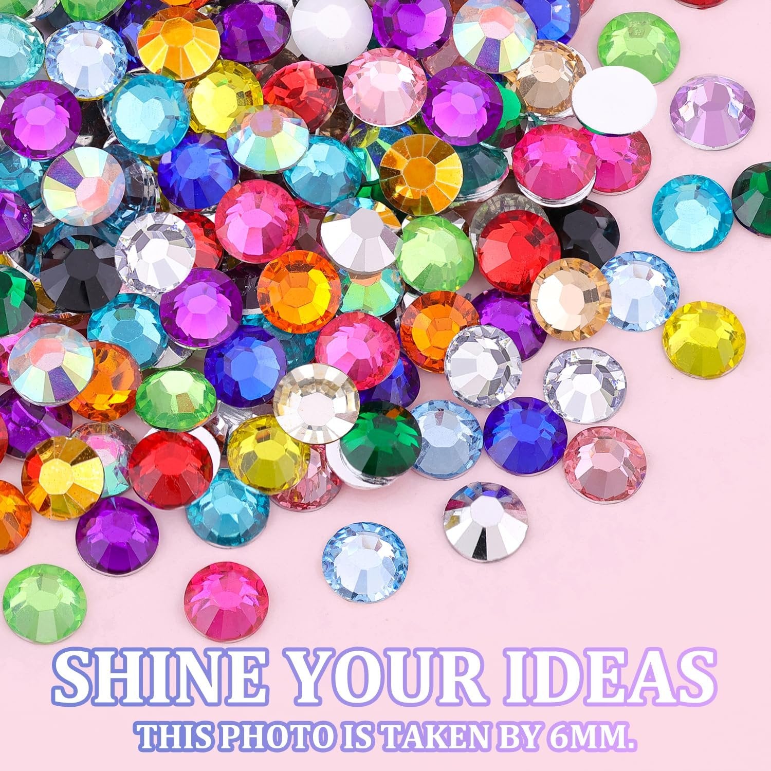 Assorted colorful resin rhinestones scattered on a pink background, with text overlays.