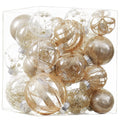 Clear plastic Christmas ball ornaments in champagne gold glitter fill, arranged in a clear box.