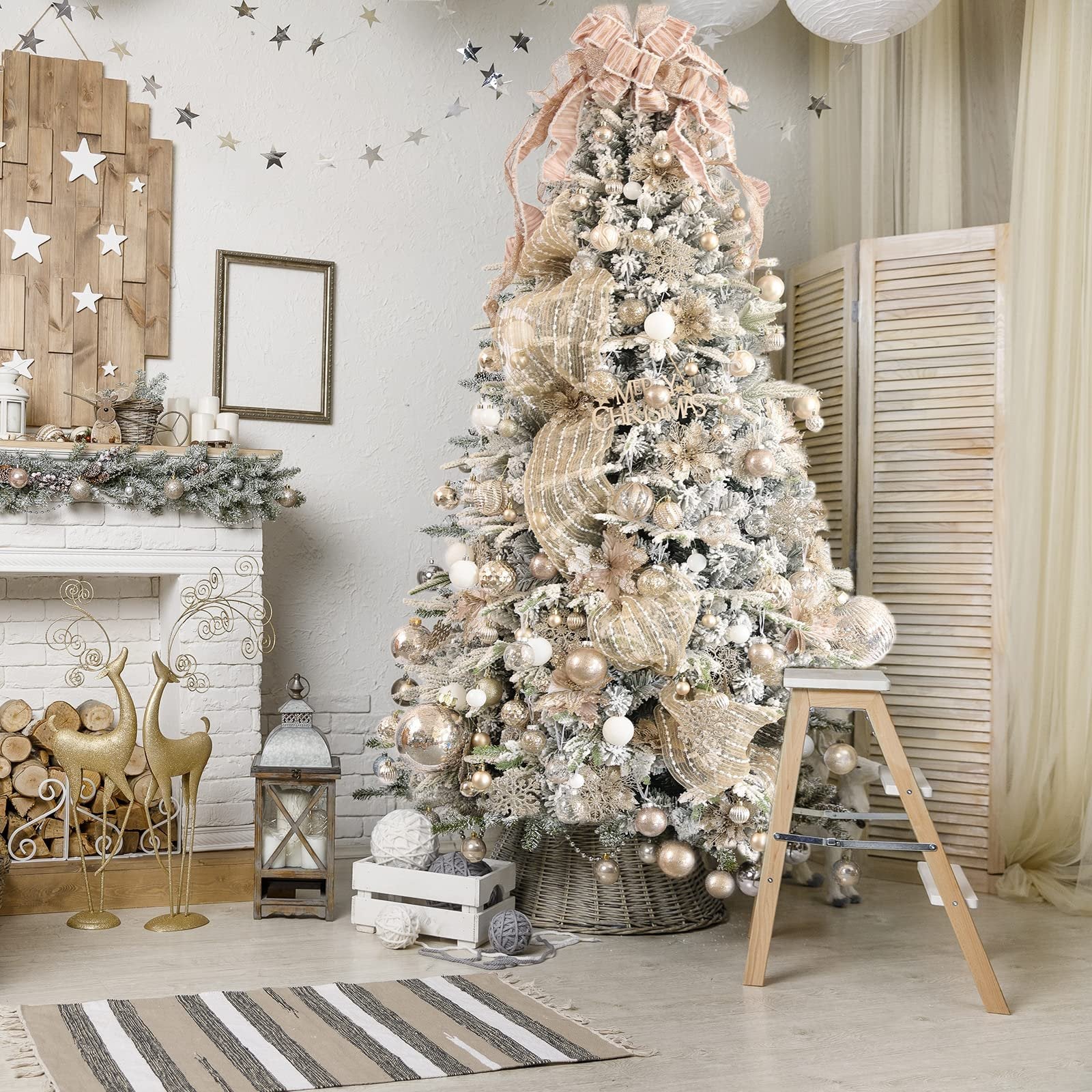 Decorated Christmas tree with champagne and gold ornaments, fireplace, and reindeer figures.