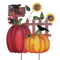 Metal garden stake with pumpkins, sunflowers, crows, and 'I LOVE FALL' sign on a picket fence background.