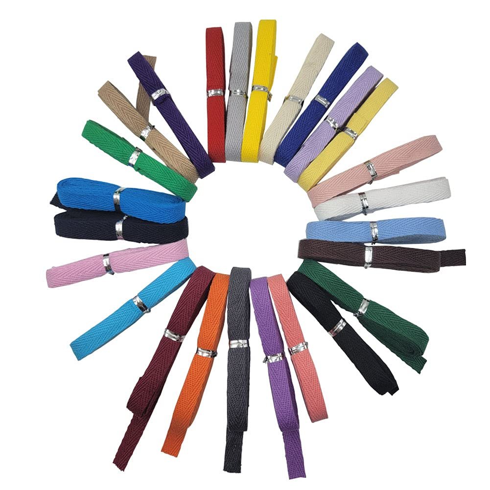 Collection of 25 colorful cotton twill tapes arranged in a circle, each rolled and secured with a silver band.